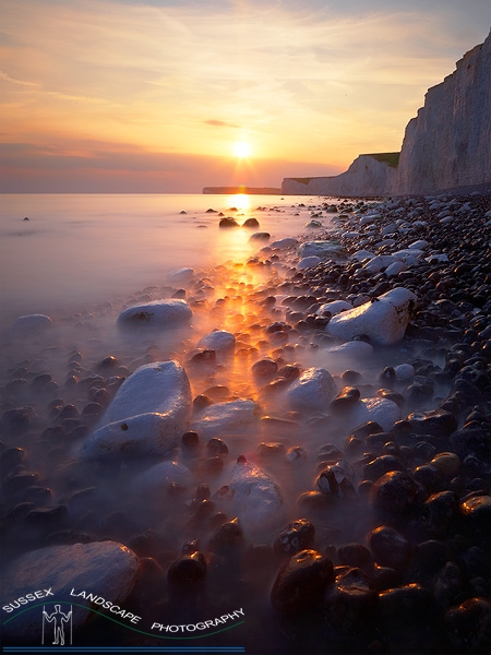 slides/Fire Water.jpg sussex east birling.gap beach pools tide ocean coast beachy head lighthouse eastbourne rocks water ocean people person clouds storm cliffs pebbles red white blue seven sisters country park moon cresent ripples sand Fire Water